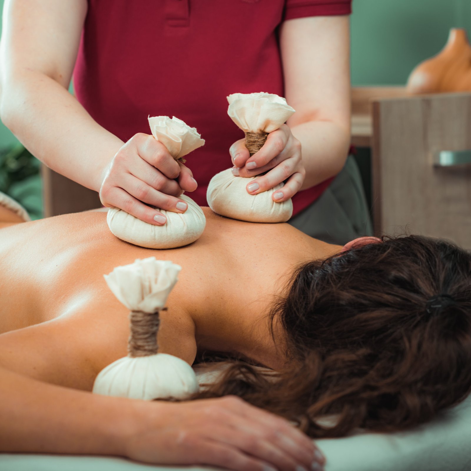 woman relaxing during herbal compress massage ther 2026 01 05 06 32 42 utc scaled